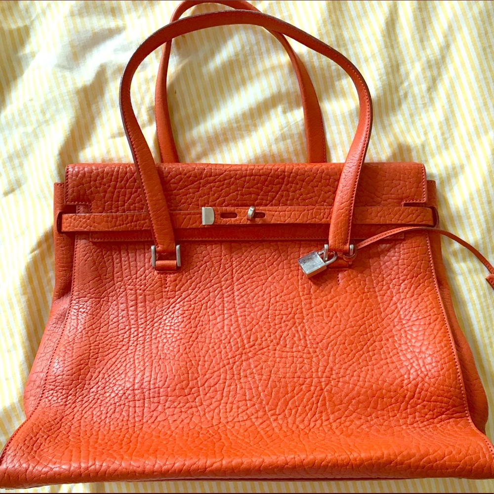 PRICE DROPgenuine leather orange bag.Made in Italy